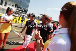 (L to R): Bruno Senna (BRA) Williams with Jean-Eric Vergne (FRA) Scuderia Toro Rosso on the drivers parade. 29.07.2012. Formula 1 World Championship, Rd 11, Hungarian Grand Prix, Budapest, Hungary, Race Day