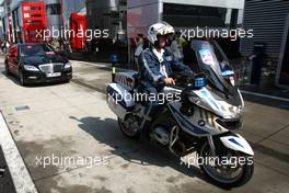Bernie Ecclestone (GBR) arrive at the track with a police escort. 29.07.2012. Formula 1 World Championship, Rd 11, Hungarian Grand Prix, Budapest, Hungary, Race Day