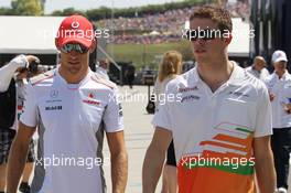(L to R): Jenson Button (GBR) McLaren with Paul di Resta (GBR) Sahara Force India F1. 29.07.2012. Formula 1 World Championship, Rd 11, Hungarian Grand Prix, Budapest, Hungary, Race Day