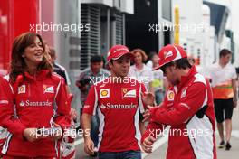 Felipe Massa (BRA) Ferrari (Centre) and team mate Fernando Alonso (ESP) Ferrari (Right). 26.07.2012. Formula 1 World Championship, Rd 11, Hungarian Grand Prix, Budapest, Hungary, Preparation Day