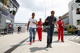 Felipe Massa (BRA) Ferrari arrives in the paddock. 26.07.2012. Formula 1 World Championship, Rd 11, Hungarian Grand Prix, Budapest, Hungary, Preparation Day