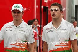(L to R): Nico Hulkenberg (GER) Sahara Force India F1 with team mate Paul di Resta (GBR) Sahara Force India F1. 26.07.2012. Formula 1 World Championship, Rd 11, Hungarian Grand Prix, Budapest, Hungary, Preparation Day