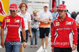 (L to R): Felipe Massa (BRA) Ferrari with tm Fernando Alonso (ESP) Ferrari. 26.07.2012. Formula 1 World Championship, Rd 11, Hungarian Grand Prix, Budapest, Hungary, Preparation Day