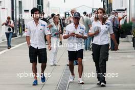 (L to R): Sergio Perez (MEX) Sauber with team mate Kamui Kobayashi (JPN) Sauber. 26.07.2012. Formula 1 World Championship, Rd 11, Hungarian Grand Prix, Budapest, Hungary, Preparation Day