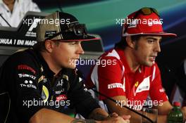 (L to R): Kimi Raikkonen (FIN) Lotus F1 Team and Fernando Alonso (ESP) Ferrari in the FIA Press Conference. 26.07.2012. Formula 1 World Championship, Rd 11, Hungarian Grand Prix, Budapest, Hungary, Preparation Day