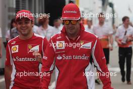(L to R): Felipe Massa (BRA) Ferrari with team mate Fernando Alonso (ESP) Ferrari. 26.07.2012. Formula 1 World Championship, Rd 11, Hungarian Grand Prix, Budapest, Hungary, Preparation Day