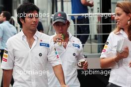 (L to R): Sergio Perez (MEX) Sauber with team mate Kamui Kobayashi (JPN) Sauber. 26.07.2012. Formula 1 World Championship, Rd 11, Hungarian Grand Prix, Budapest, Hungary, Preparation Day