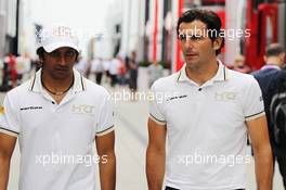 (L to R): Narain Karthikeyan (IND) Hispania Racing F1 Team (HRT) with team mate Pedro De La Rosa (ESP) HRT Formula 1 Team. 26.07.2012. Formula 1 World Championship, Rd 11, Hungarian Grand Prix, Budapest, Hungary, Preparation Day
