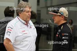 (L to R): Norbert Haug (GER) Mercedes Sporting Director with Kimi Raikkonen (FIN) Lotus F1 Team. 26.07.2012. Formula 1 World Championship, Rd 11, Hungarian Grand Prix, Budapest, Hungary, Preparation Day