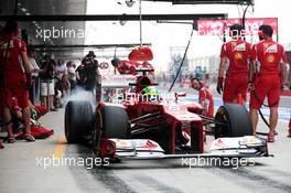 Felipe Massa (BRA) Ferrari F2012 leaves the pits. 26.10.2012.Formula 1 World Championship, Rd 17, Indian Grand Prix, New Delhi, India, Practice Day.