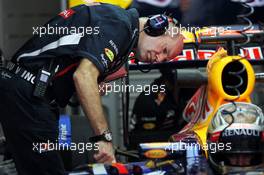 Adrian Newey (GBR) Red Bull Racing Chief Technical Officer with Sebastian Vettel (GER) Red Bull Racing RB8. 26.10.2012.Formula 1 World Championship, Rd 17, Indian Grand Prix, New Delhi, India, Practice Day.