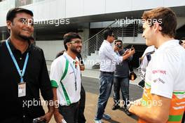 Jules Bianchi (FRA) Sahara Force India F1 Team Third Driver with fans. 26.10.2012.Formula 1 World Championship, Rd 17, Indian Grand Prix, New Delhi, India, Practice Day.