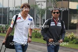 (L to R): Esteban Gutierrez (MEX) Sauber Third Driver, who is replacing the 'unwell' Sergio Perez (MEX) Sauber in the first practice session. 26.10.2012.Formula 1 World Championship, Rd 17, Indian Grand Prix, New Delhi, India, Practice Day.