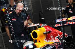 Adrian Newey (GBR) Red Bull Racing Chief Technical Officer with Sebastian Vettel (GER) Red Bull Racing RB8. 26.10.2012.Formula 1 World Championship, Rd 17, Indian Grand Prix, New Delhi, India, Practice Day.