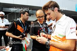 Jules Bianchi (FRA) Sahara Force India F1 Team Third Driver with fans. 26.10.2012.Formula 1 World Championship, Rd 17, Indian Grand Prix, New Delhi, India, Practice Day.