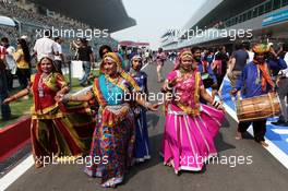 Dancers in the pit lane. 26.10.2012.Formula 1 World Championship, Rd 17, Indian Grand Prix, New Delhi, India, Practice Day.