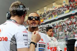 Lewis Hamilton (GBR) McLaren on the grid. 28.10.2012. Formula 1 World Championship, Rd 17, Indian Grand Prix, New Delhi, India, Race Day.