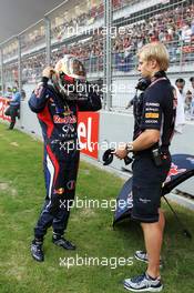 Sebastian Vettel (GER) Red Bull Racing on the grid. 28.10.2012. Formula 1 World Championship, Rd 17, Indian Grand Prix, New Delhi, India, Race Day.