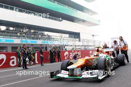 Nico Hulkenberg (GER) Sahara Force India F1 VJM05 pushed to the grid. 28.10.2012. Formula 1 World Championship, Rd 17, Indian Grand Prix, New Delhi, India, Race Day.