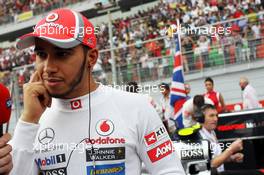 Lewis Hamilton (GBR) McLaren on the grid. 28.10.2012. Formula 1 World Championship, Rd 17, Indian Grand Prix, New Delhi, India, Race Day.