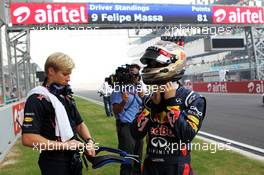 Sebastian Vettel (GER) Red Bull Racing on the grid. 28.10.2012. Formula 1 World Championship, Rd 17, Indian Grand Prix, New Delhi, India, Race Day.