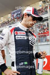 Bruno Senna (BRA) Williams on the grid. 28.10.2012. Formula 1 World Championship, Rd 17, Indian Grand Prix, New Delhi, India, Race Day.