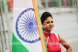 Grid girl with the Indian flag. 28.10.2012. Formula 1 World Championship, Rd 17, Indian Grand Prix, New Delhi, India, Race Day.