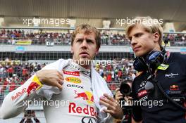 Sebastian Vettel (GER) Red Bull Racing on the grid. 28.10.2012. Formula 1 World Championship, Rd 17, Indian Grand Prix, New Delhi, India, Race Day.