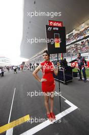 Grid girl for Sebastian Vettel (GER) Red Bull Racing. 28.10.2012. Formula 1 World Championship, Rd 17, Indian Grand Prix, New Delhi, India, Race Day.