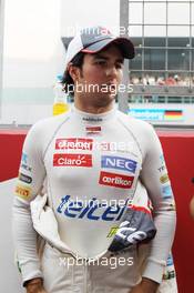 Sergio Perez (MEX) Sauber on the grid. 28.10.2012. Formula 1 World Championship, Rd 17, Indian Grand Prix, New Delhi, India, Race Day.