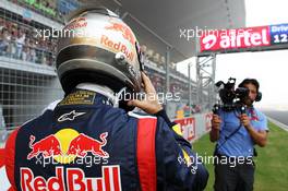 Sebastian Vettel (GER) Red Bull Racing on the grid. 28.10.2012. Formula 1 World Championship, Rd 17, Indian Grand Prix, New Delhi, India, Race Day.