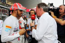 (L to R): Lewis Hamilton (GBR) McLaren on the grid with Martin Brundle (GBR) Sky Sports Commentator. 28.10.2012. Formula 1 World Championship, Rd 17, Indian Grand Prix, New Delhi, India, Race Day.
