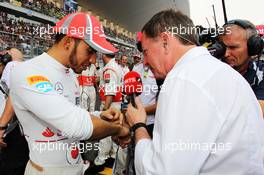 (L to R): Lewis Hamilton (GBR) McLaren on the grid with Martin Brundle (GBR) Sky Sports Commentator. 28.10.2012. Formula 1 World Championship, Rd 17, Indian Grand Prix, New Delhi, India, Race Day.