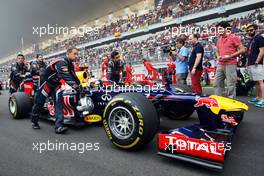 Sebastian Vettel (GER) Red Bull Racing RB8 on the grid. 28.10.2012. Formula 1 World Championship, Rd 17, Indian Grand Prix, New Delhi, India, Race Day.