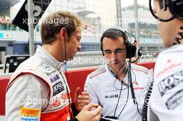 Jenson Button (GBR) McLaren on the grid. 28.10.2012. Formula 1 World Championship, Rd 17, Indian Grand Prix, New Delhi, India, Race Day.