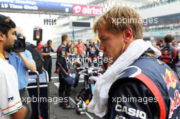 Sebastian Vettel (GER) Red Bull Racing on the grid. 28.10.2012. Formula 1 World Championship, Rd 17, Indian Grand Prix, New Delhi, India, Race Day.