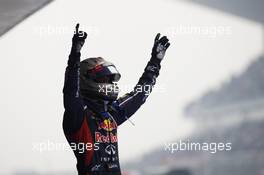 Race winner Sebastian Vettel (GER) Red Bull Racing celebrates in parc ferme. 28.10.2012. Formula 1 World Championship, Rd 17, Indian Grand Prix, New Delhi, India, Race Day.