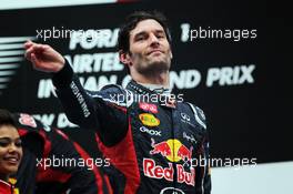 Mark Webber (AUS) Red Bull Racing celebrates on the podium. 28.10.2012. Formula 1 World Championship, Rd 17, Indian Grand Prix, New Delhi, India, Race Day.