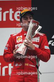Fernando Alonso (ESP) Ferrari celebrates his second position on the podium. 28.10.2012. Formula 1 World Championship, Rd 17, Indian Grand Prix, New Delhi, India, Race Day.