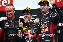 The podium (L to R): Jonathan Wheatley (GBR) Red Bull Racing Team Manager; Sebastian Vettel (GER) Red Bull Racing, race winner; Mark Webber (AUS) Red Bull Racing, third. 28.10.2012. Formula 1 World Championship, Rd 17, Indian Grand Prix, New Delhi, India, Race Day.