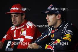(L to R): Fernando Alonso (ESP) Ferrari and Sebastian Vettel (GER) Red Bull Racing in the FIA Press Conference. 28.10.2012. Formula 1 World Championship, Rd 17, Indian Grand Prix, New Delhi, India, Race Day.