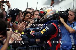Race winner Sebastian Vettel (GER) Red Bull Racing celebrates in parc ferme. 28.10.2012. Formula 1 World Championship, Rd 17, Indian Grand Prix, New Delhi, India, Race Day.