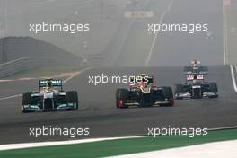 Nico Rosberg (GER), Mercedes GP and Romain Grosjean (FRA), Lotus F1 Team  28.10.2012. Formula 1 World Championship, Rd 17, Indian Grand Prix, New Delhi, India, Race Day