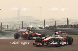 Lewis Hamilton (GBR) McLaren MP4/27 leads Felipe Massa (BRA) Ferrari F2012. 28.10.2012. Formula 1 World Championship, Rd 17, Indian Grand Prix, New Delhi, India, Race Day.