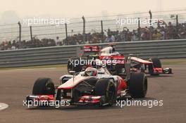 Lewis Hamilton (GBR) McLaren MP4/27 leads team mate Jenson Button (GBR) McLaren MP4/27. 28.10.2012. Formula 1 World Championship, Rd 17, Indian Grand Prix, New Delhi, India, Race Day.