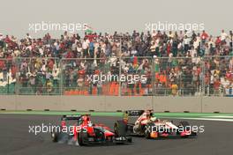 Timo Glock (GER), Marussia F1 Team and Pedro de la Rosa (GBR), HRT Racing Team  28.10.2012. Formula 1 World Championship, Rd 17, Indian Grand Prix, New Delhi, India, Race Day