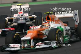 Nico Hulkenberg (GER), Sahara Force India Formula One Team and Sergio Perez (MEX), Sauber F1 Team  28.10.2012. Formula 1 World Championship, Rd 17, Indian Grand Prix, New Delhi, India, Race Day