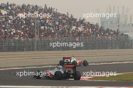 Lewis Hamilton (GBR) McLaren MP4/27 leads team mate Jenson Button (GBR) McLaren MP4/27. 28.10.2012. Formula 1 World Championship, Rd 17, Indian Grand Prix, New Delhi, India, Race Day.