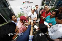 Nico Hulkenberg (GER) Sahara Force India F1 with the media. 27.10.2012. Formula 1 World Championship, Rd 17, Indian Grand Prix, New Delhi, India, Qualifying Day.