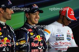 The post qualifying FIA Press Conference (L to R): Mark Webber (AUS) Red Bull Racing, second; Sebastian Vettel (GER) Red Bull Racing, pole position; Lewis Hamilton (GBR) McLaren, third. 27.10.2012. Formula 1 World Championship, Rd 17, Indian Grand Prix, New Delhi, India, Qualifying Day.